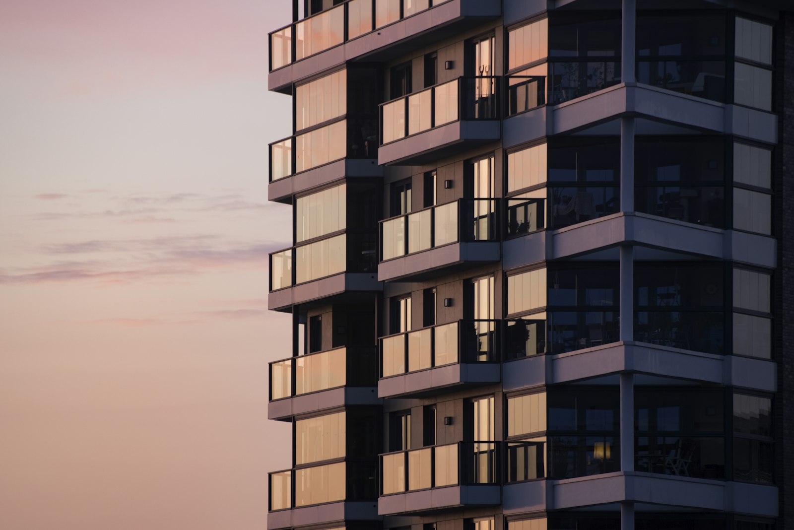 Contemporary white building lit by the sun